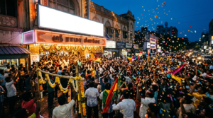 Pokiri 2006 4K re-release — crowd outside a cinema showing a Telugu action classic