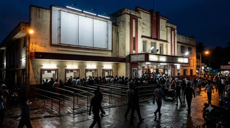Tollywood box office 2025 rankings: crowd queuing at a Telugu cinema ticket counter at night